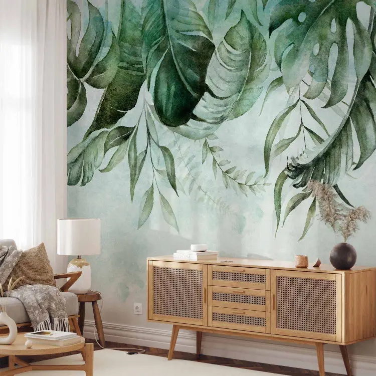 História verde - folhas de palmeira e monstera em tons pastéis sobre fundo claro