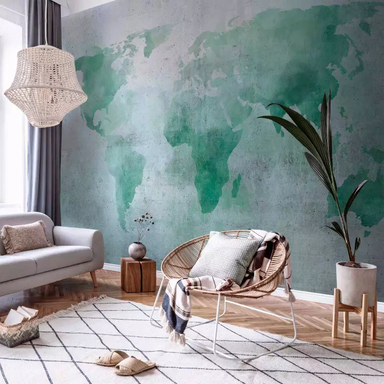 Mundo Menta - mapa-múndi pintado em aquarela em fundo de concreto