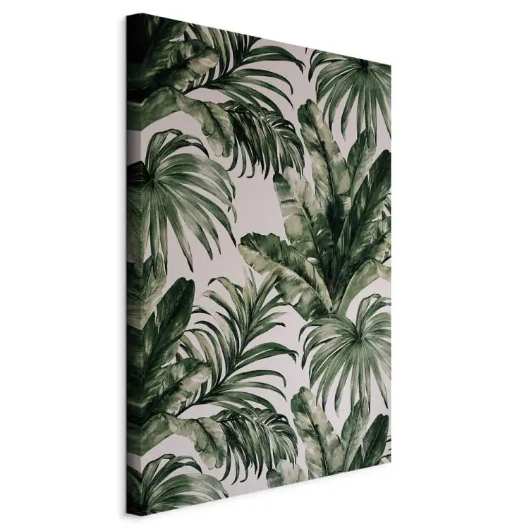 Natureza tropical - grandes folhas verdes escuras sobre um fundo cinzento