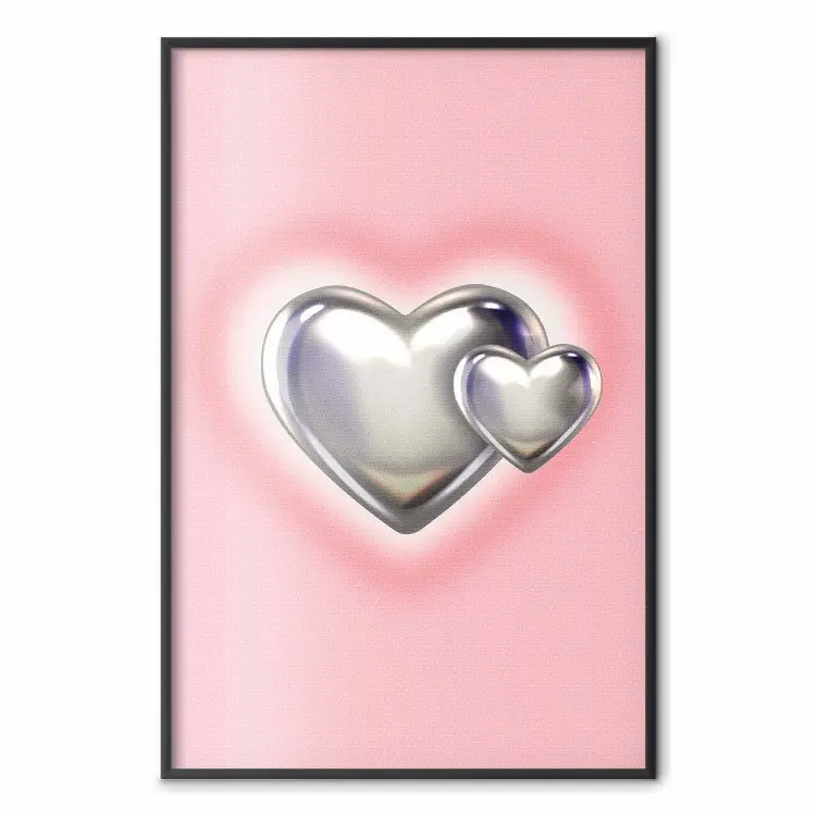 Amor metálico - corações prateados sobre um fundo cor-de-rosa suave com um efeito de desfocagem