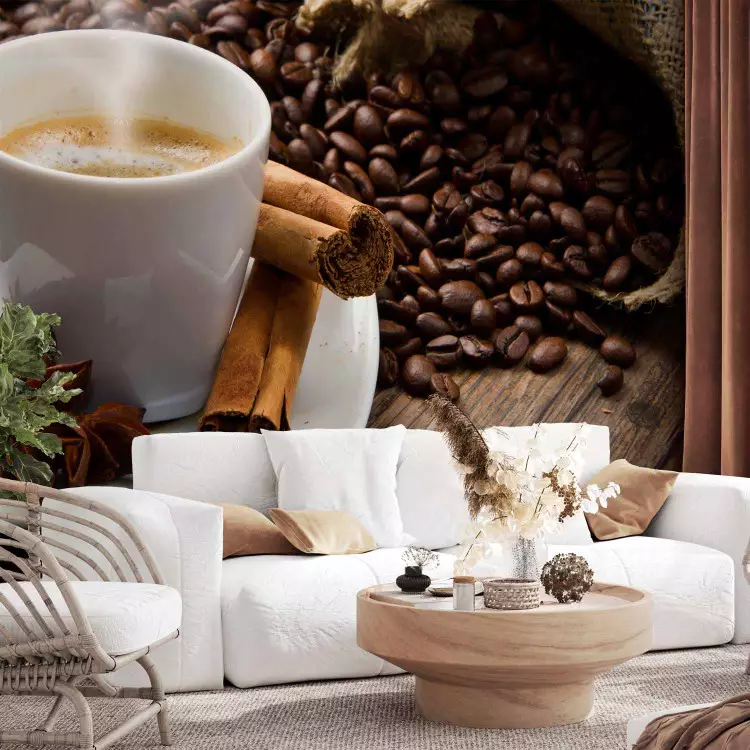 Café - grãos de café espalhados ao lado de uma xícara sobre um fundo de madeira, perfeito para a cozinha