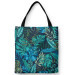 Saco Monstera in blue glow - plant motif with exotic leaves 147559